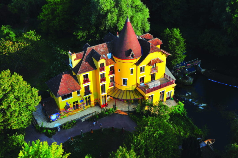 This colorful house located an hour from Paris is home to a quirky and enchanting universe