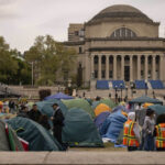 Pro-Palestinian students sanctioned by Columbia for refusing to leave encampment