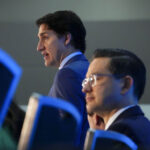 Trudeau accuses Poilievre of flirting with conspiracy theorists