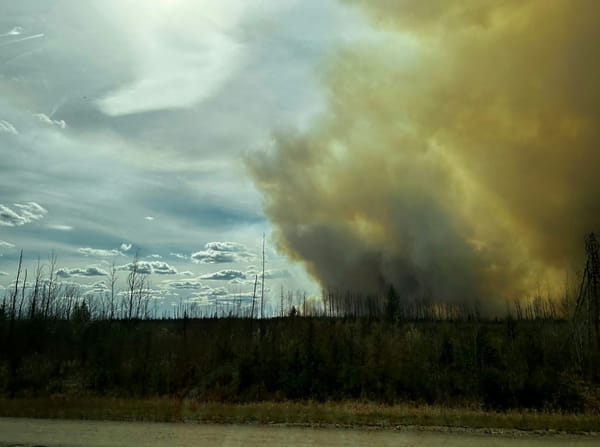 Wildfire threatens oil town in western Canada, new evacuations