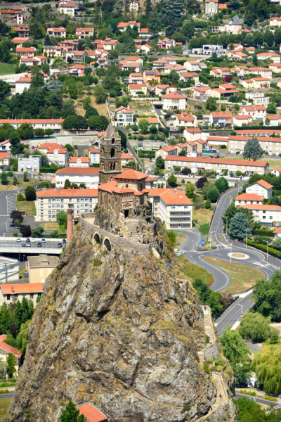 Perched at the top of a volcanic peak, this French chapel is dizzying and contains many secrets