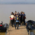 In Spain, search for flood victims extends to beaches and lagoons