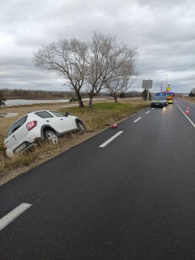 The driver feels unwell and swerves: the car in front avoids her but ends up in the ditch