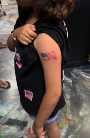 &#39;I get a lot of criticism about it&#39;: Man agrees to tattoo American flag on 9-year-old girl&#39;s arm